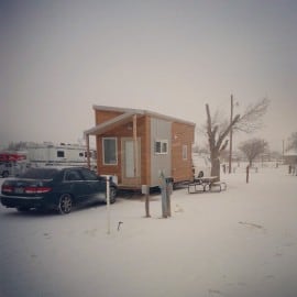 tiny house in snowstorm